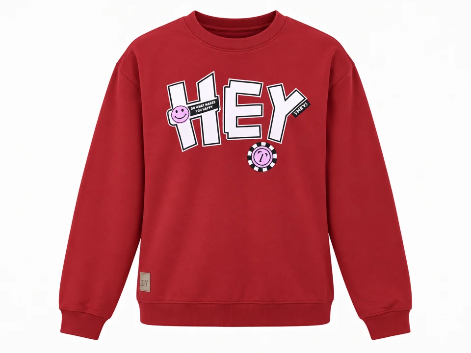 Red long-sleeved crewneck sweatshirt with white HEY lettering, pink smiley graphics and lower woven patch