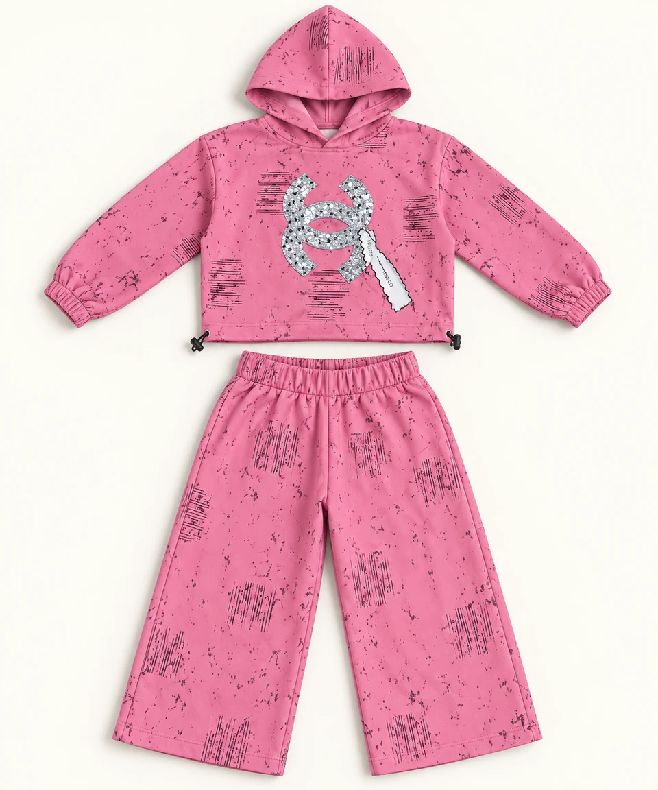 Pink Printed Pullover Hoodie and Trouser Set on a warm studio background