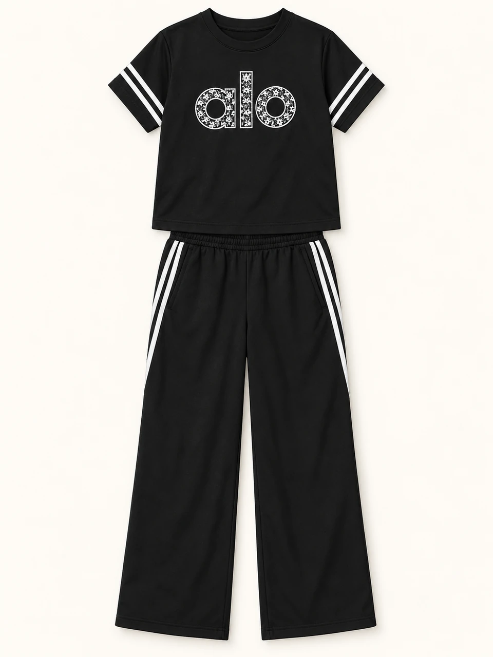Black Striped Graphic T-shirt and Trouser Set on a warm studio background