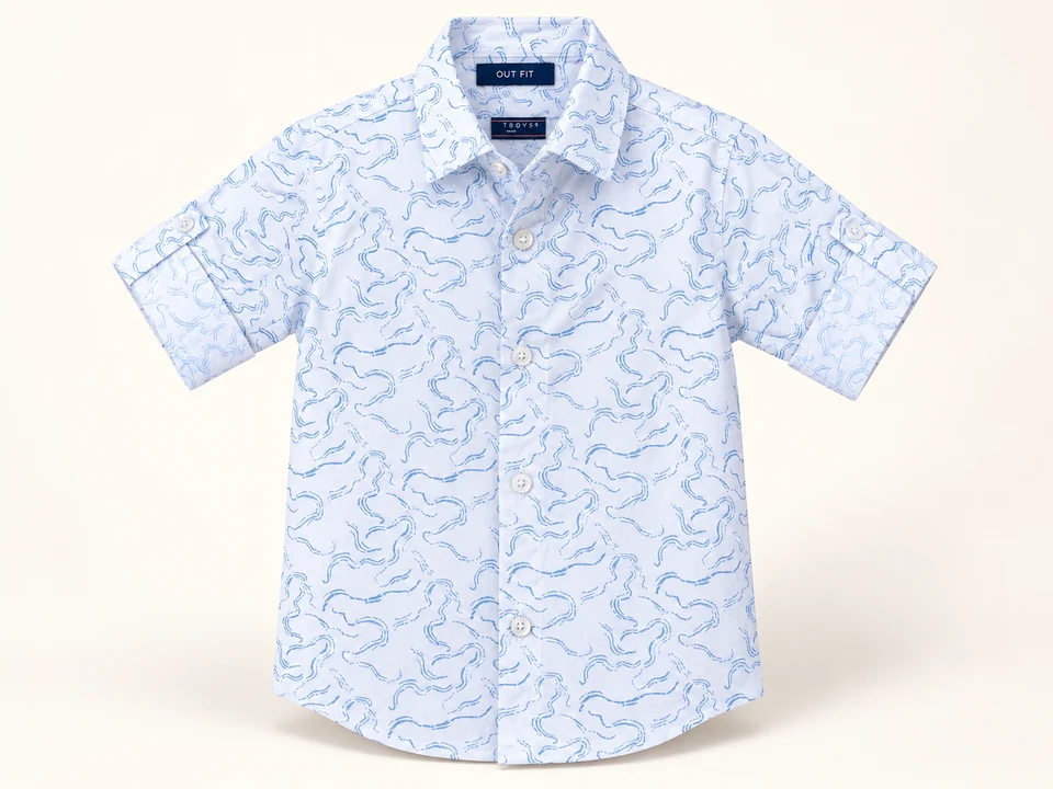 White and Blue Patterned Shirt on a warm studio background
