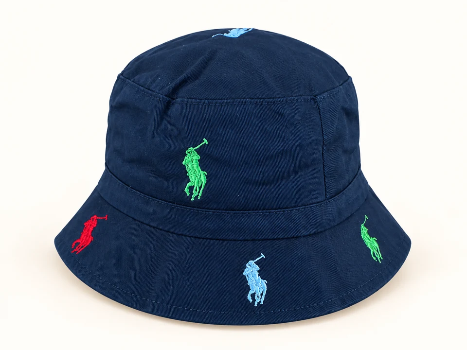 Navy Multicolour Embroidered Bucket Hat on a warm studio background