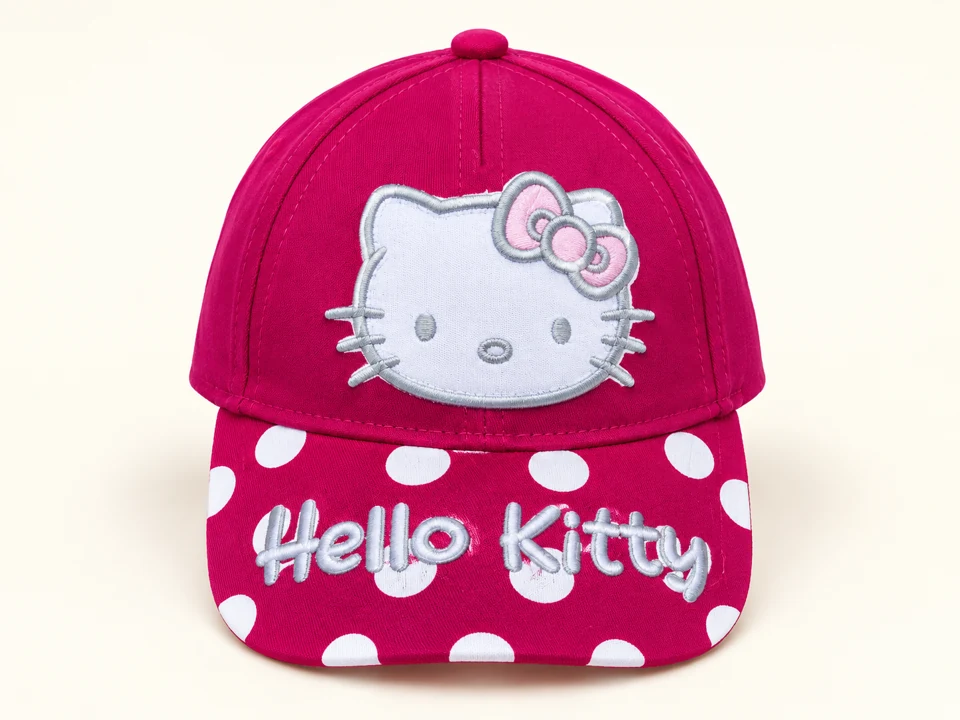 Pink Hello Kitty Cap on a warm studio background